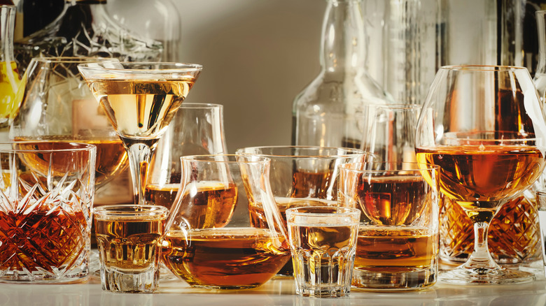 Glasses of different liqueurs.