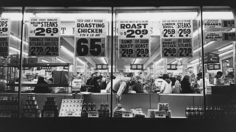 grocery store in the 1980s displays sale posters