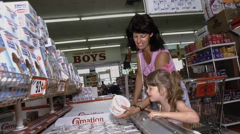 mother and daughter shop in 1980s grocer