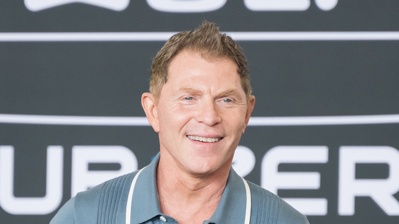 Bobby Flay smiling during cooking demonstration