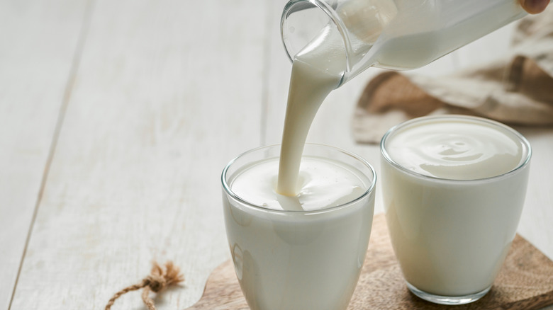 pouring kefir into glass