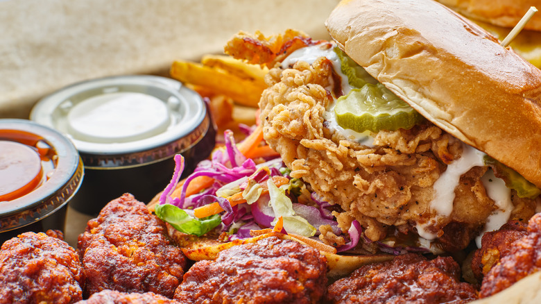 platter with chicken sandwich and chicken wings