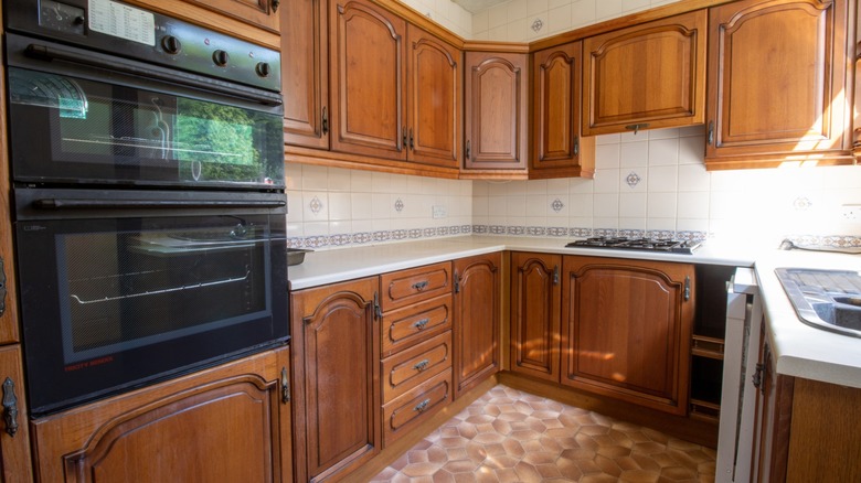 retros 1980s kitchen with black wall oven