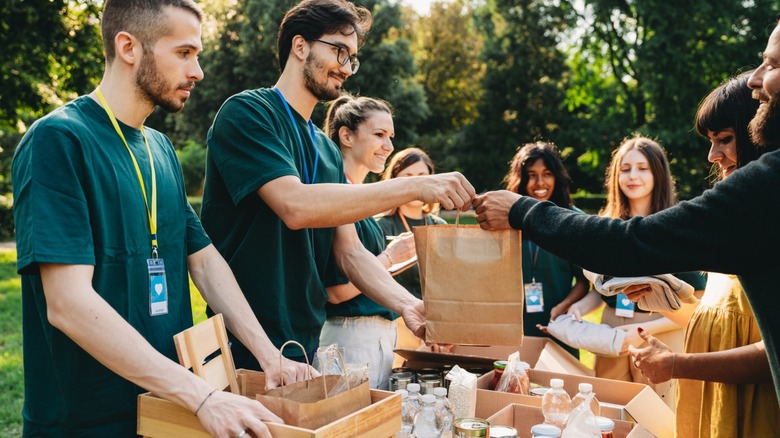 volunteers distribute food at food bank event