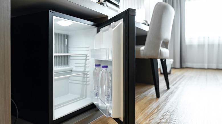 Hotel mini-fridge with door open