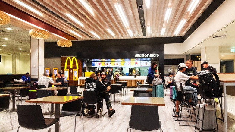 customers dine inside a mcdonald's restaurant