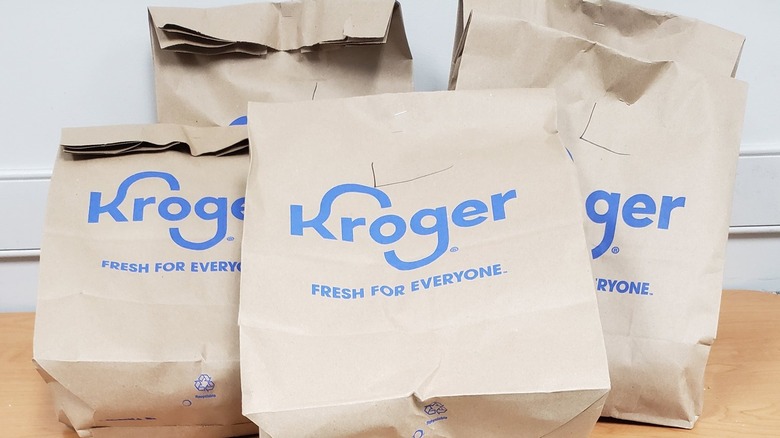 Brown paper Kroger-branded bags.