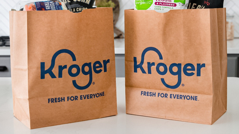 Closeup Kroger-branded paper shopping bags.