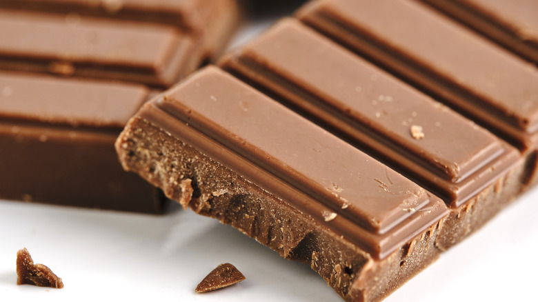 Bar of milk chocolate white background