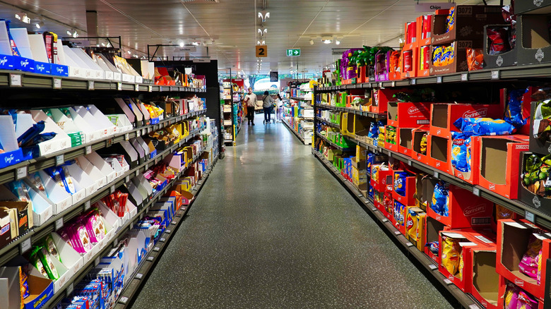 Aldi candy aisle showing products in shipping boxes