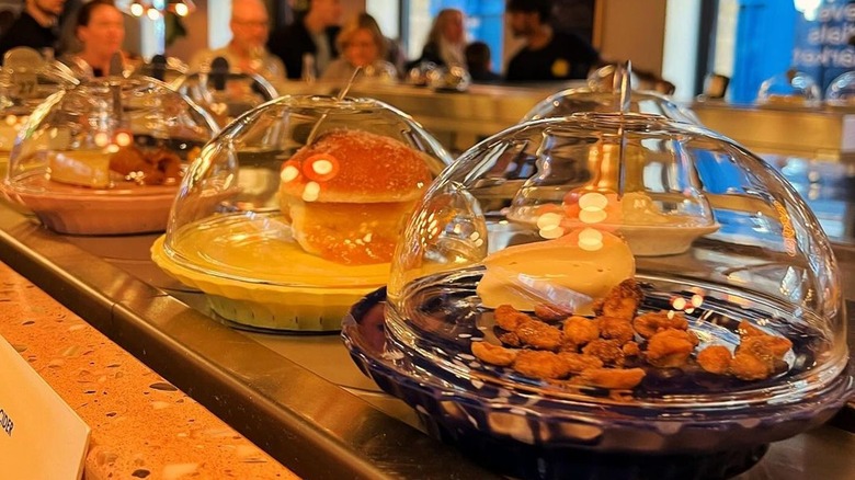 Conveyor belt at London's rotating cheese bar