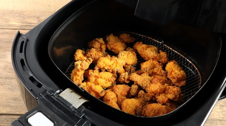 Fried chicken in air fryer basket