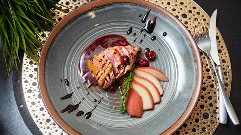 Elegant plated roast duck dish