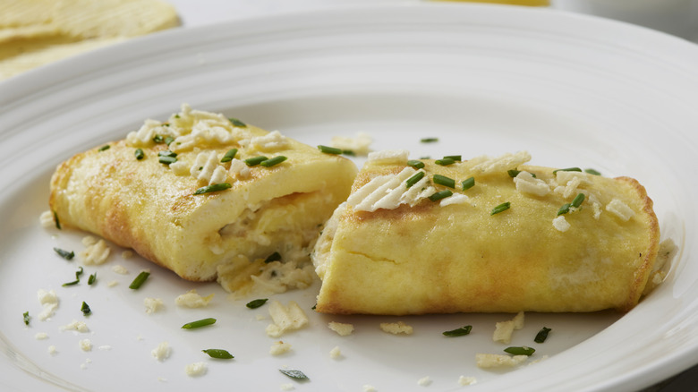 French style omelette with chives and crushed potato chips