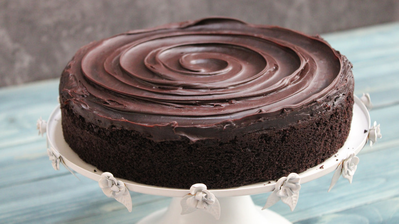 Chocolate ganache cake on tray