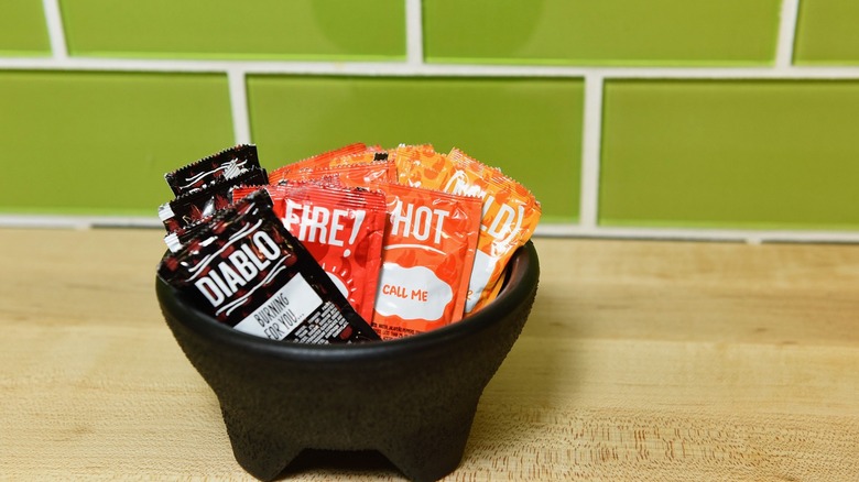 taco bell sauce packets in bowl