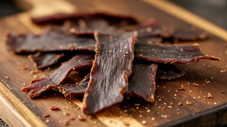 Smoky beef jerky made from marinated and dried beef slices
