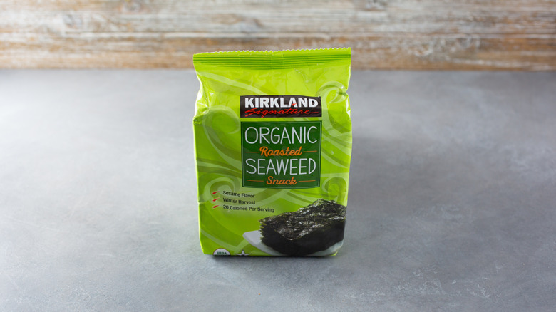 Kirkland Signature seaweed snack bag on gray counter.