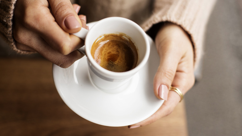 Espresso with light crema in white cup