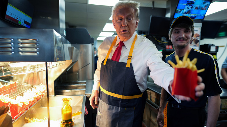Donald Trump holds french fries at a McDonald's location in PA