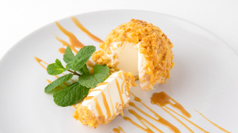 ice cream covered in cereal crumbs
