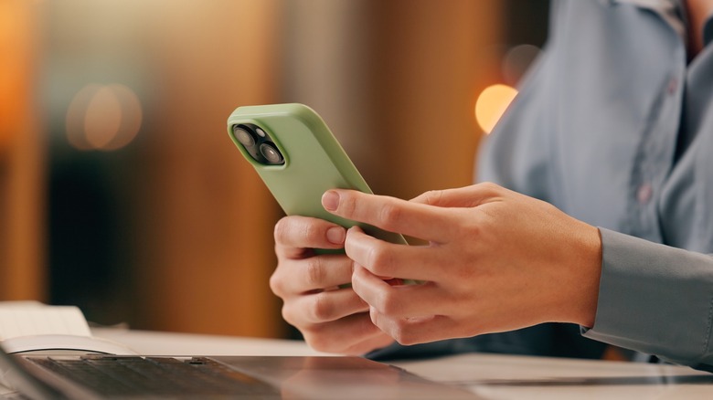 customer with hands on phone
