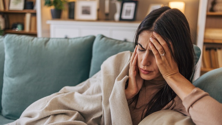 person experiencing a headache