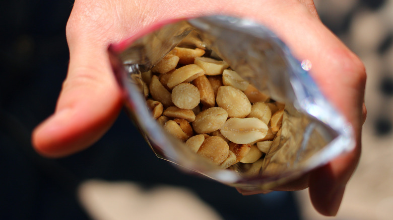 The inside of a packet of peanuts