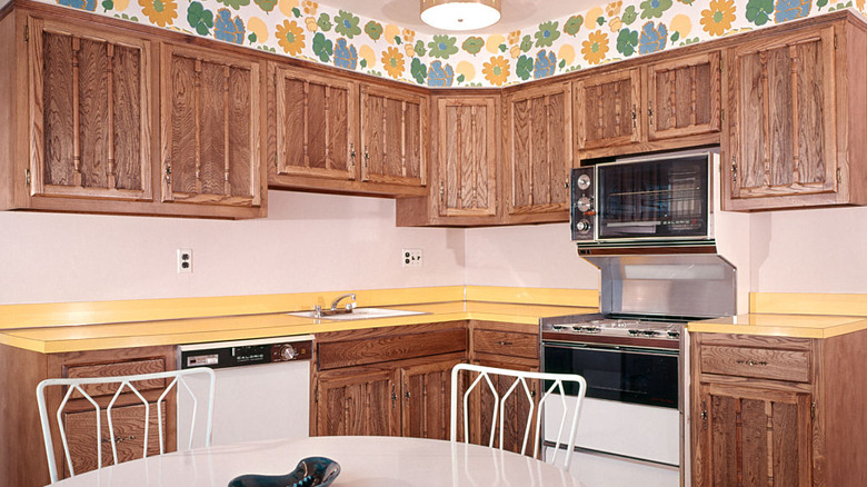 1970s kitchen interior with yellow laminate countertops
