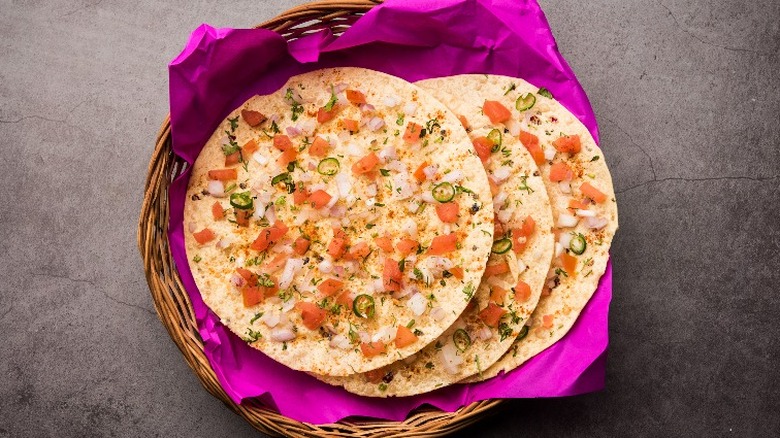 Masala papad on purple napkin 