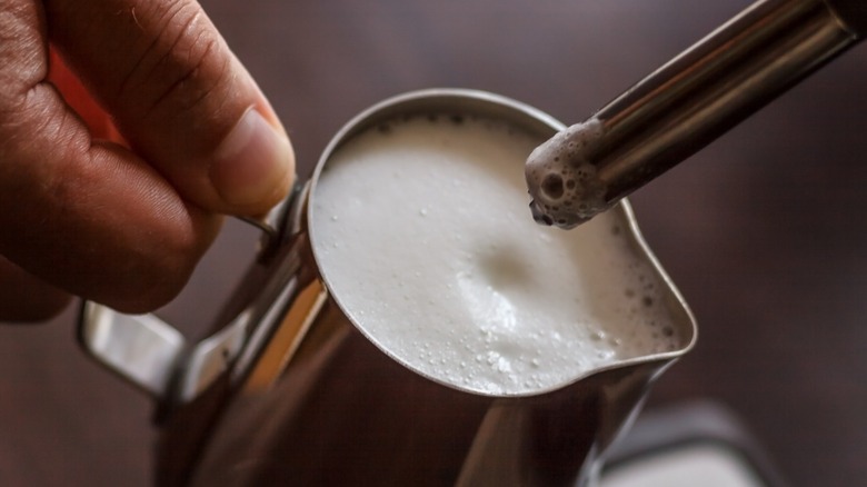close-up of steam wand for heating milk