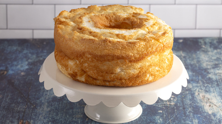 Close-up of an angel food cake on a white cake stand