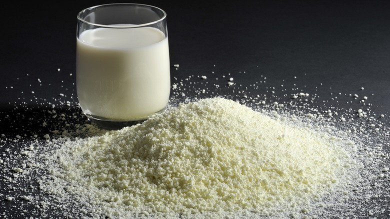 glass of milk and powdered milk