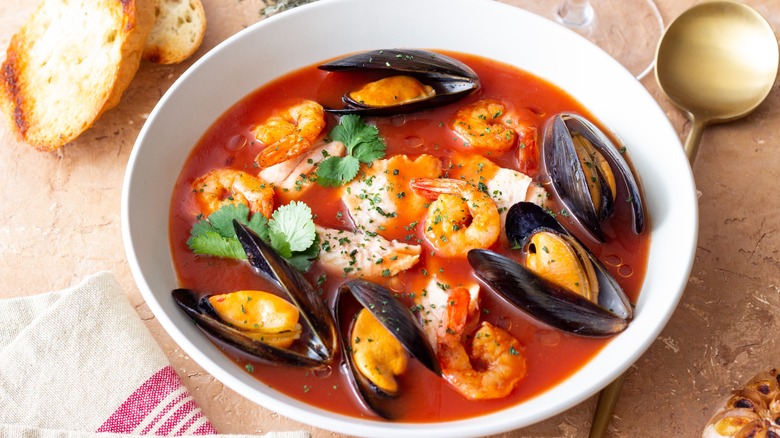 Bouillabaisse soup with fish, mussels, and shrimps.