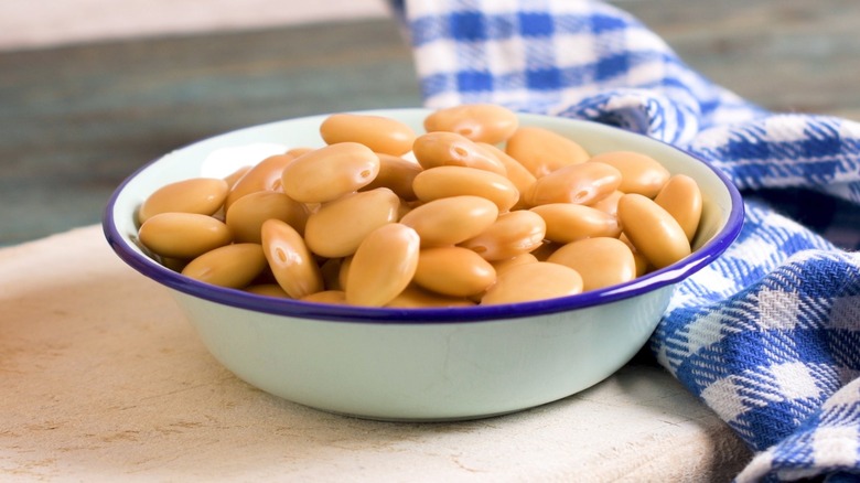 bowl of lupini beans with blue cloth