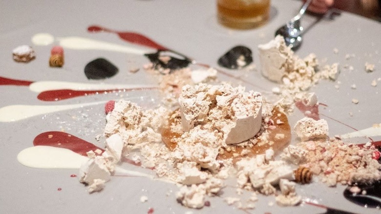 A close-up of food served on the table at Chicago's iconic Alinea restaurant