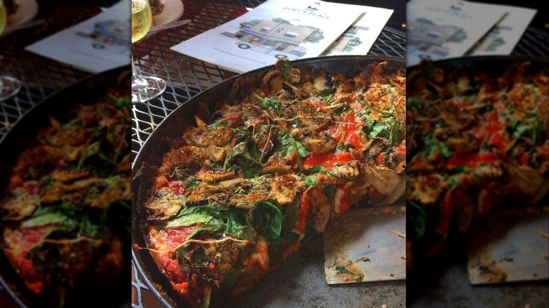 A close-up of a deep-pan pizza from Burt's Place in Chicago