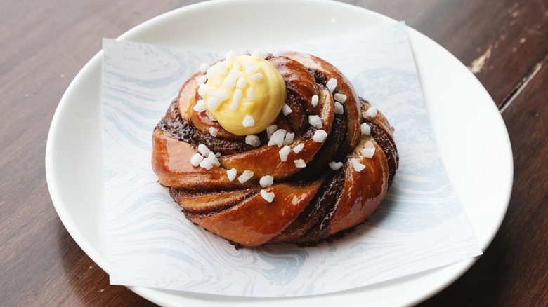A close-up of a cardamom bun with yuzu curd from Chicago's iconic Lula Cafe