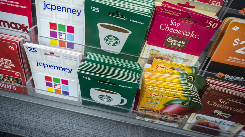 a display of various gift cards in rack