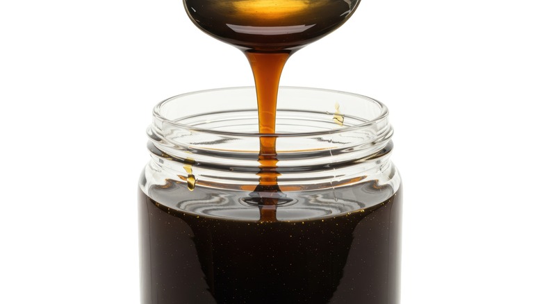 molasses pours from spoon