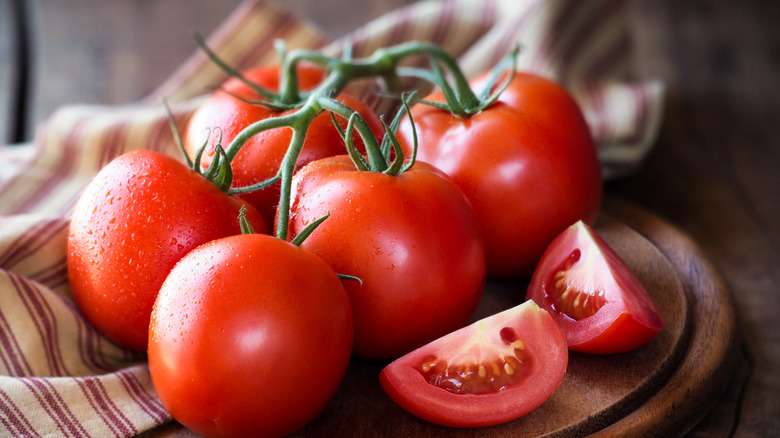 fresh whole tomatoes on counter