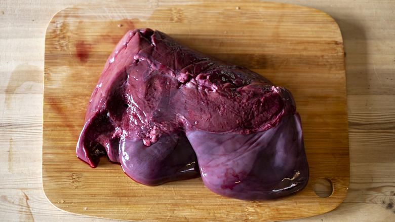 Beef liver on a chopping board